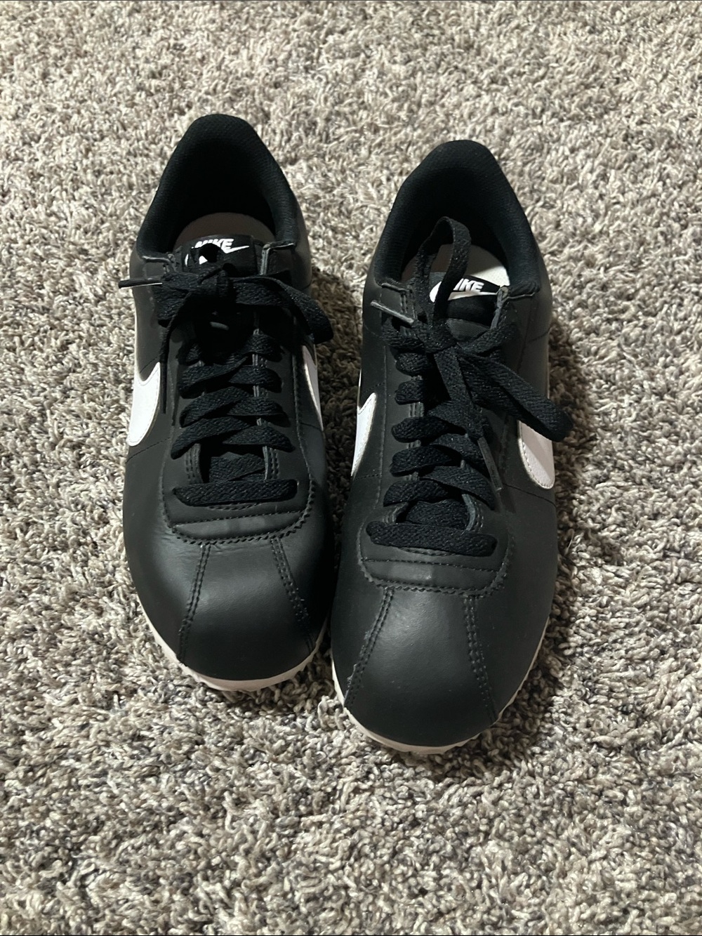 Nike Black Sneakers with White Swoosh